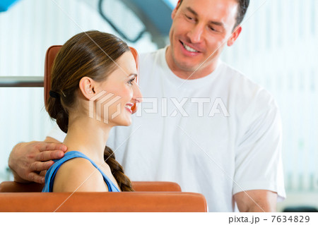 Patient at the physiotherapy doing physical therapy 7634829