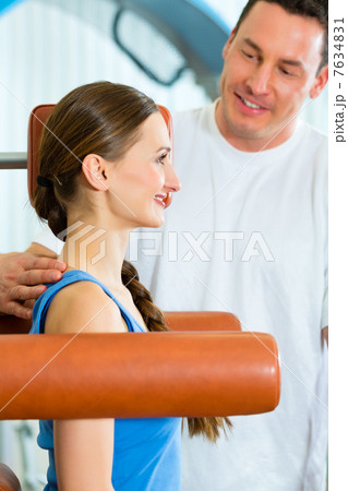 Patient at the physiotherapy doing physical therapy 7634831