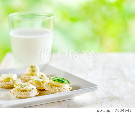 Several canapes and glass of milk Several canapes and glass of milk 7634945