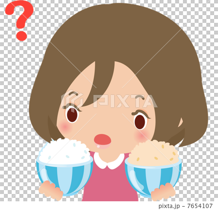 A woman comparing white rice and brown rice A woman comparing white rice and brown rice 7654107