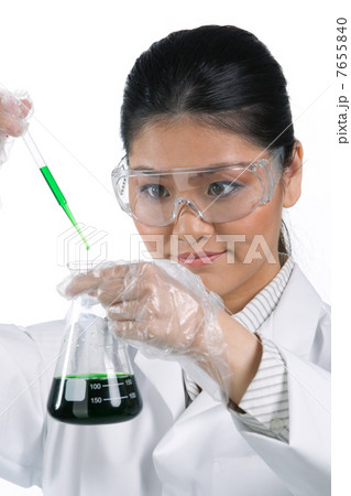 Portrait of scientist analyzing a solution. Portrait of scientist analyzing a solution. 7655840
