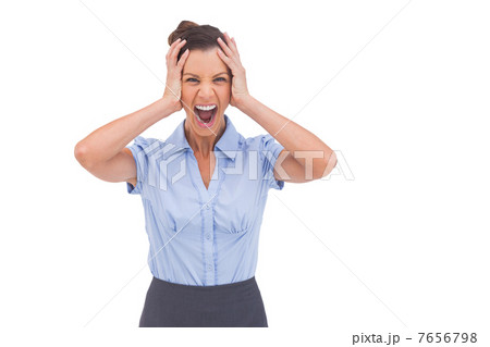 Stressed businessswoman with hand on her head Stressed businessswoman with hand on her head 7656798