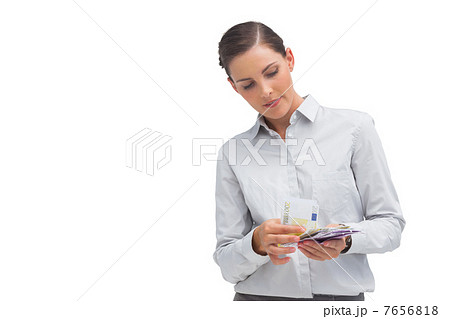 Happy businesswoman counting money Happy businesswoman counting money 7656818