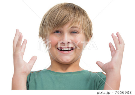 Suprised blonde boy with hands up Suprised blonde boy with hands up 7656938