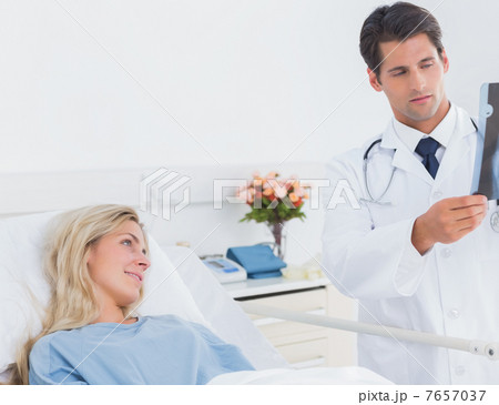 Attractive doctor showing xray 7657037