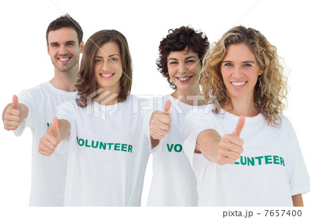 Group of volunteers giving thumbs up 7657400