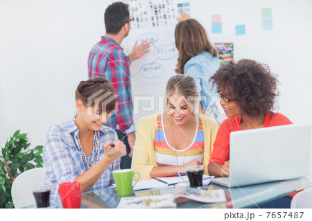 Designers having a brainstorm together Designers having a brainstorm together 7657487