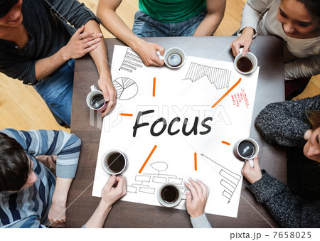 Focus written on a poster with drawings of charts Focus written on a poster with drawings of charts 7658025