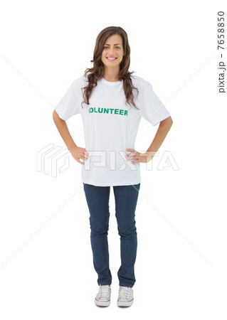 Woman wearing volunteer tshirt putting her hands on hips 7658850