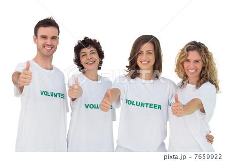 Cheerful group of volunteers giving thums up 7659922