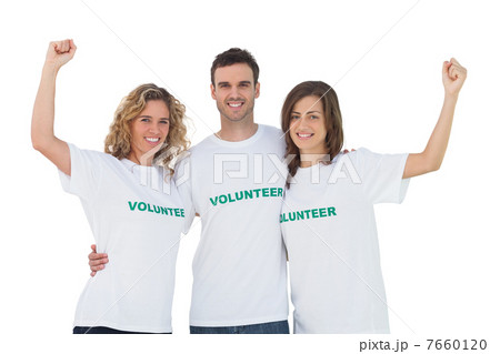 Smiling group of volunteers raising arms 7660120