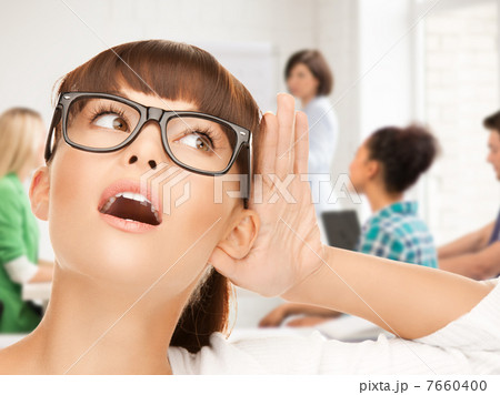 student girl listening gossip at school 7660400