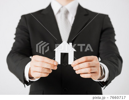 man hands holding paper house man hands holding paper house 7660717