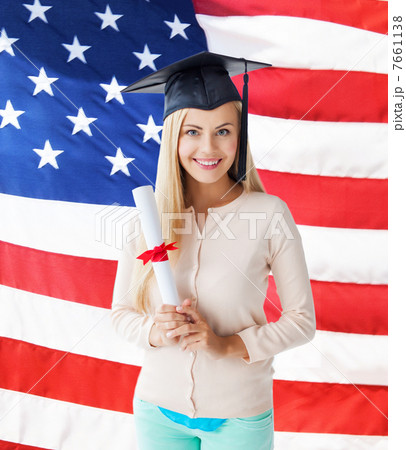 student in graduation cap with certificate student in graduation cap with certificate 7661138