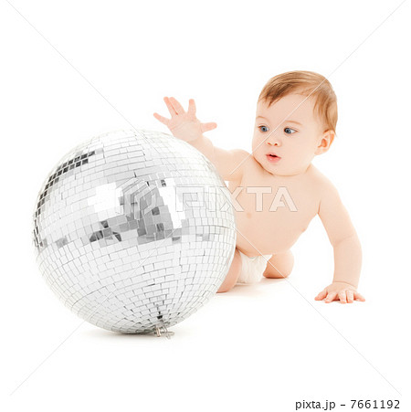 child playing with disco ball 7661192