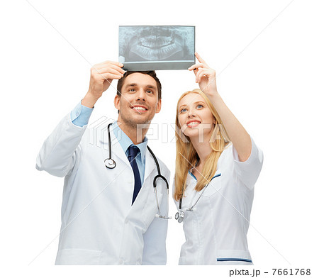 two doctors looking at x-ray 7661768