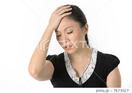 Asian woman with headache Asian woman with headache 7673027