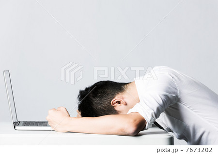 Overworked business man. 7673202