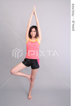 kissing red apple healthy happy smiling girl in simple white shirt]\ 7682408