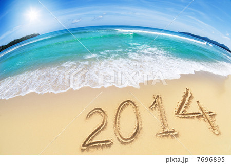 wide angle shot of beach with blue sky and 2014 year digits wide angle shot of beach with blue sky and 2014 year digits 7696895