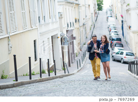 Happy couple walking together in Paris 7697269
