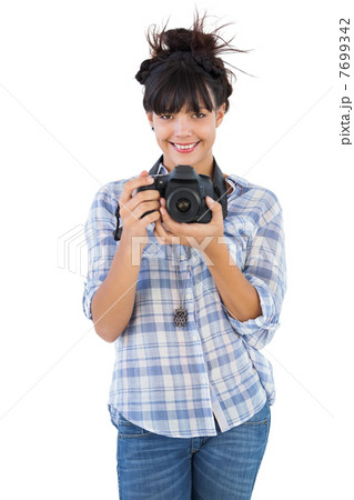 Young woman holding camera for taking picture Young woman holding camera for taking picture 7699342