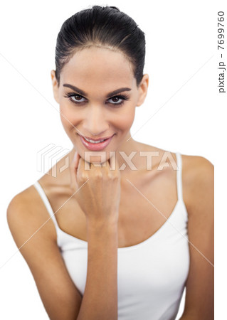 Beautiful brunette posing and looking at camera 7699760