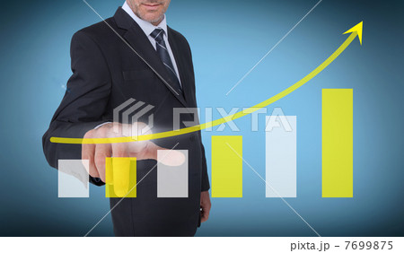 Businessman touching a chart with an arrow pointing up 7699875
