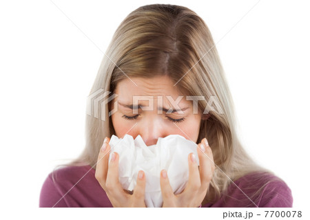 Sick woman with handkerchief on her hands 7700078