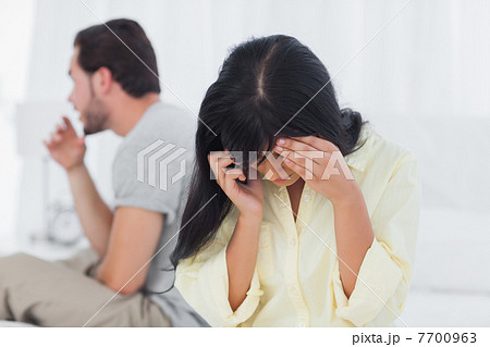 Woman calling and crying during dispute Woman calling and crying during dispute 7700963