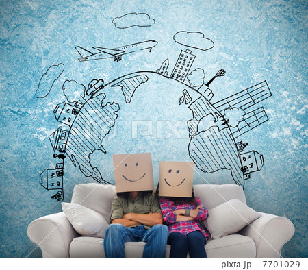 Cheerful employees with boxes on their heads Cheerful employees with boxes on their heads 7701029