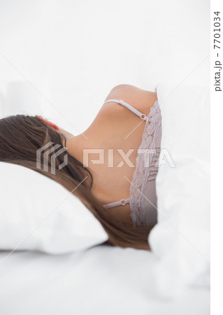 Rear view of a woman sleeping Rear view of a woman sleeping 7701034