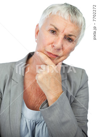 Thinking woman looking at camera 7702272