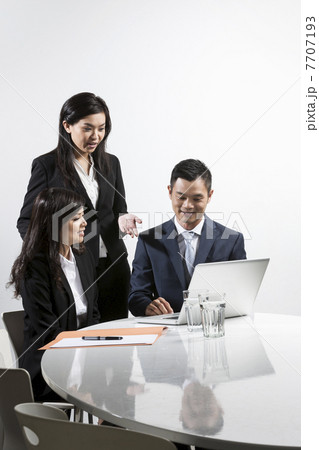 Asian business people having a meeting together Asian business people having a meeting together 7707193