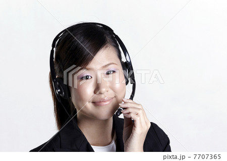 Happy female customer service representative Happy female customer service representative 7707365