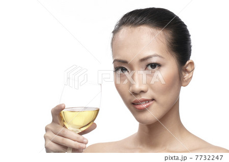 Beautiful Asian Woman with glass white wine 7732247