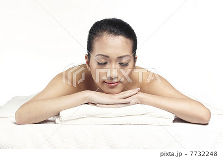 Relaxed woman ready for a massage 7732248