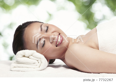 Relaxed woman ready for a massage 7732267