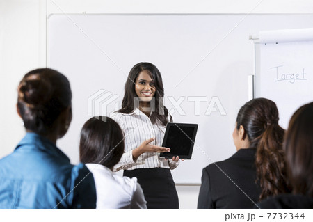 Indian Business woman giving presentation with Tablet 7732344
