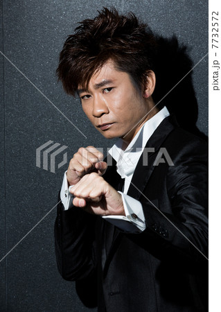 fashionable Asian man wearing stylish suit 7732572