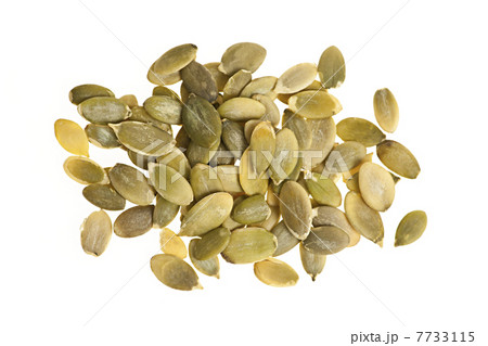 Pumpkin seeds on white 7733115