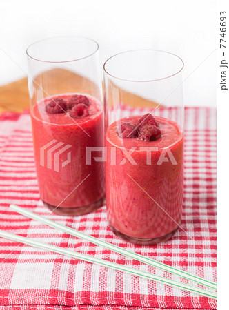 two blended thick smoothie from raspberry with tubule two blended thick smoothie from raspberry with tubule 7746693