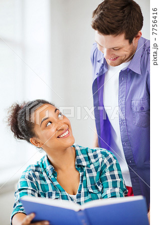 students reading book at school 7756416