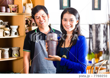 Customer in an Asian Pottery shop 7766050