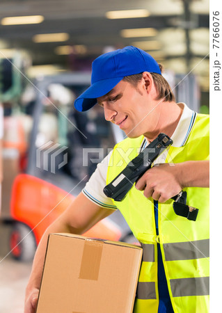worker scans package in warehouse of forwarding 7766076