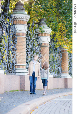 Couple walking in St.Petersburg, Russia 7766454