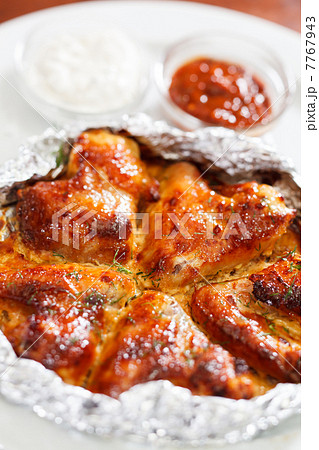 Chicken wings with sauce 7767943