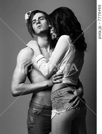 Sensuality. Love. Young Man and Woman in Cuddle 7776466