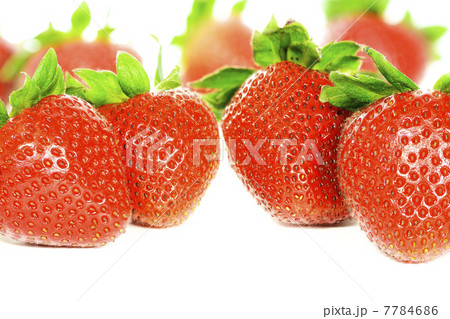 Strawberries against white background Strawberries against white background 7784686