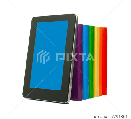 Row of colorful books and tablet PC 7791361